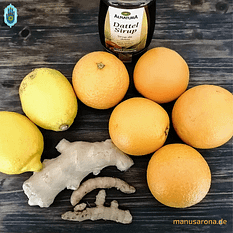 Ingwer Kurkuma Shot mit Orange Zitrone